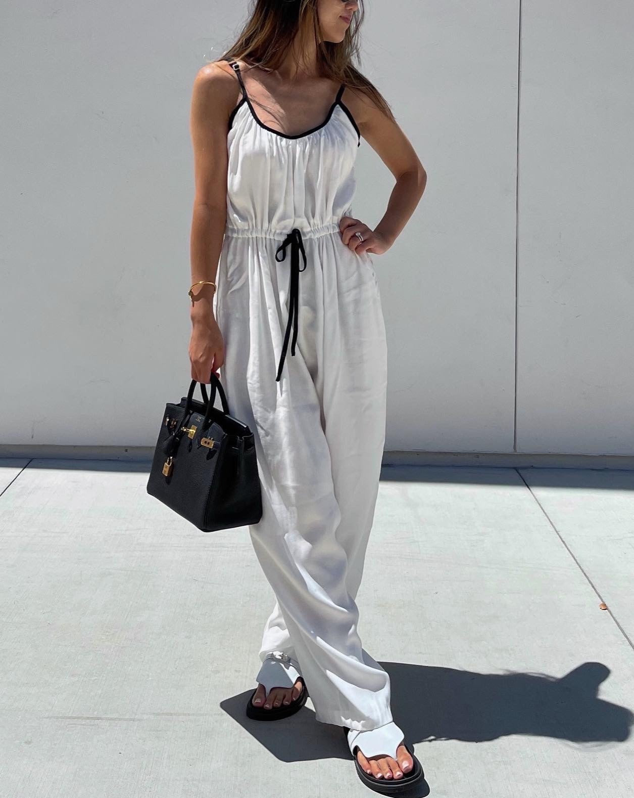 Wearing a White Jumpsuit: A Casual Womens Summer Outift Idea